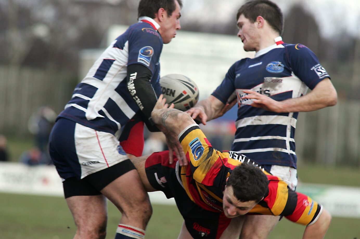 2010 - Dewsbury v Featherstone - james Haynes looses the ball between the featherstone defence